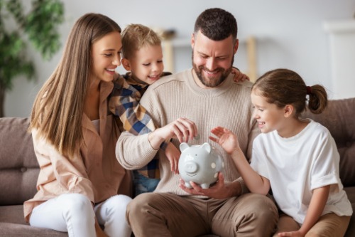 family with piggy bank